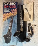 Casio Digital Horn DH-200 Electronic Wind Instrument Working W/ Box Manual Works Used. Price: $300.00.