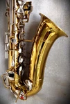 1960 Buescher S-33 "aristocrat" Alto Sax W/orig. Case & Rico A3 Mpc.- Very Nice. Price: $465.00.