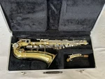 Vintage Buescher Aristocrat Alto Saxophone + Case Used. Price: $249.99.