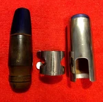 Henri Selmer Paris B* "soloiist Style" Hard Rubber Alto Sax Mpc. W/fr. Lig.& Cap Used. Price: $95.00.