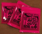 Packages Ernie Ball 2223 Super Slinky Guitar Strings New Sealed. Price: $17.85.